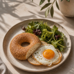 Fried Egg Sunny Side Up Bagel with Green Salad